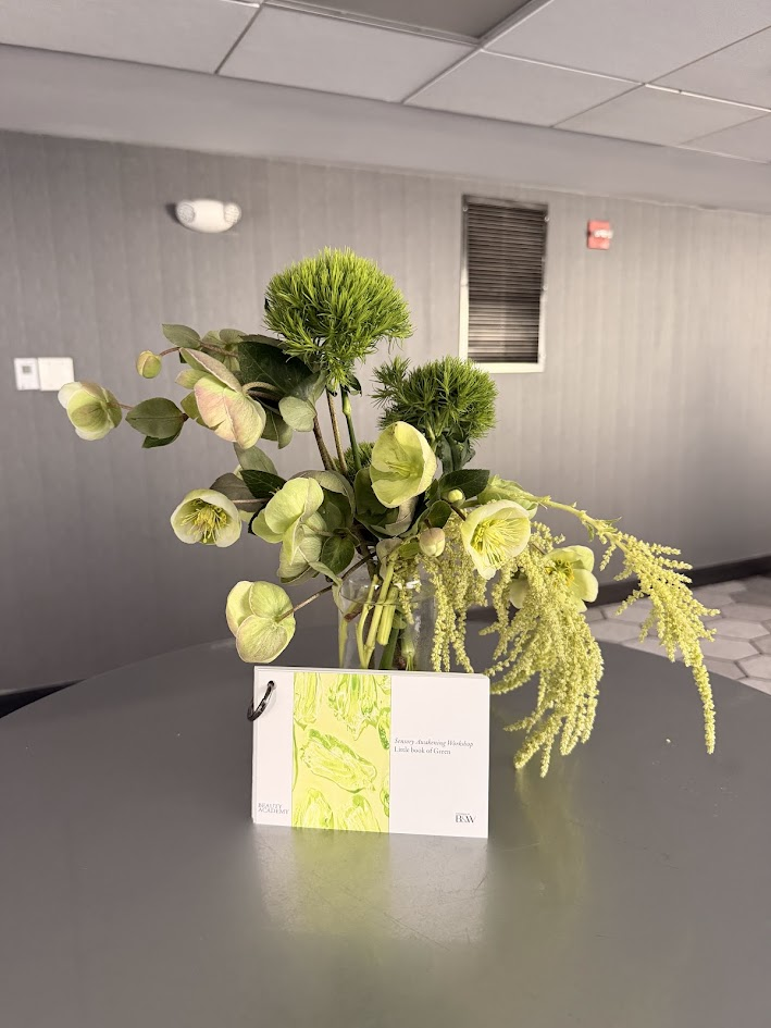 Green floral centerpiece for a Beauty Academy workshop