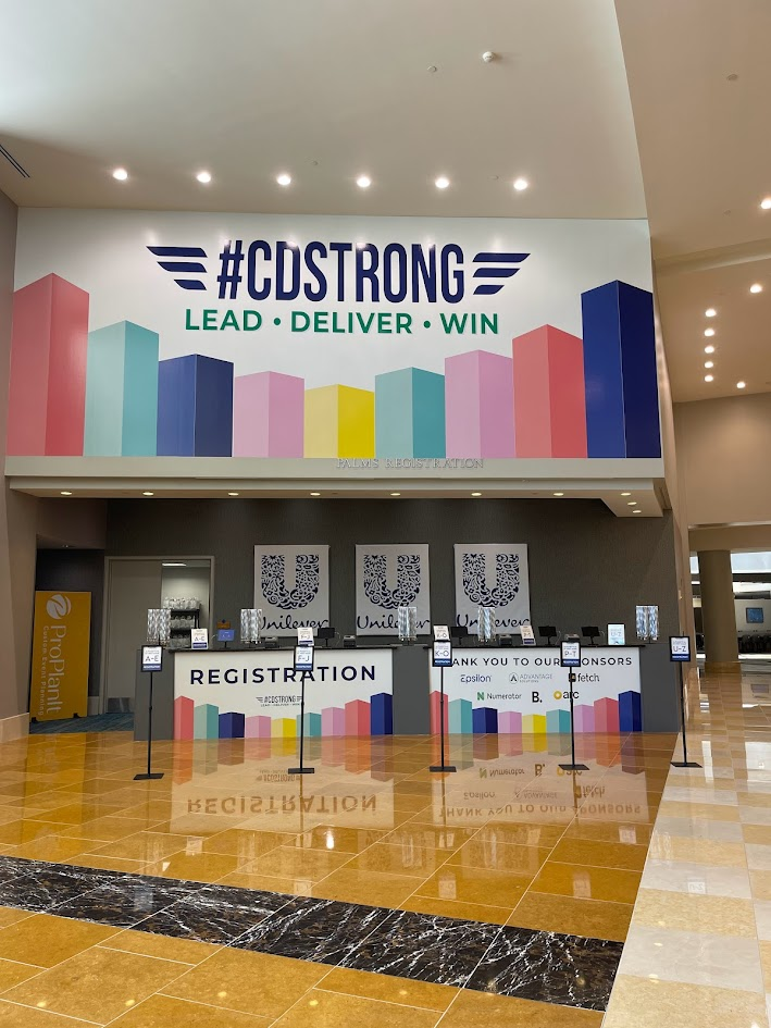 Large CDSTRONG registration wall and sponsor desk