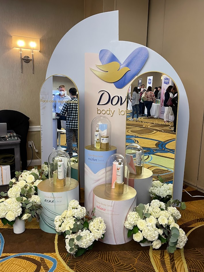 Dove Body Love product showcase with floral styling