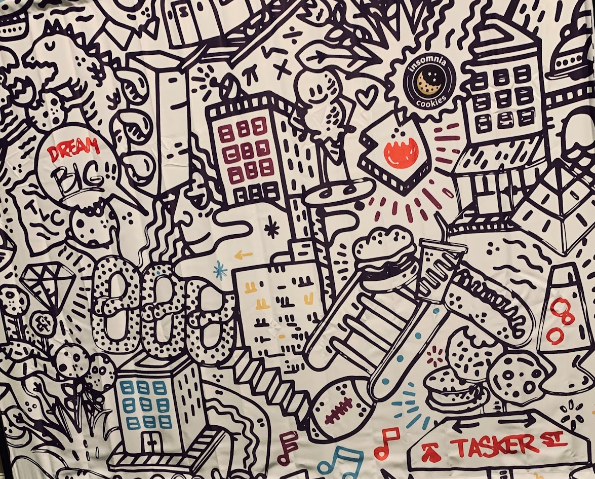 Illustrated Insomnia Cookies branded doodle wall