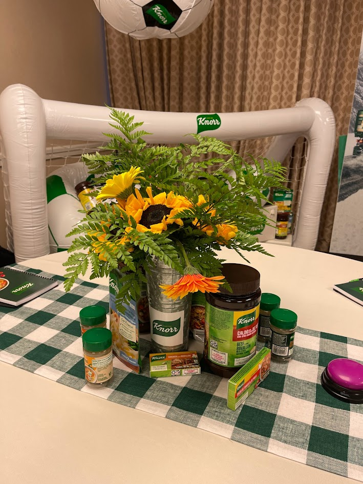 Knorr soccer themed centerpiece with sunflowers and products