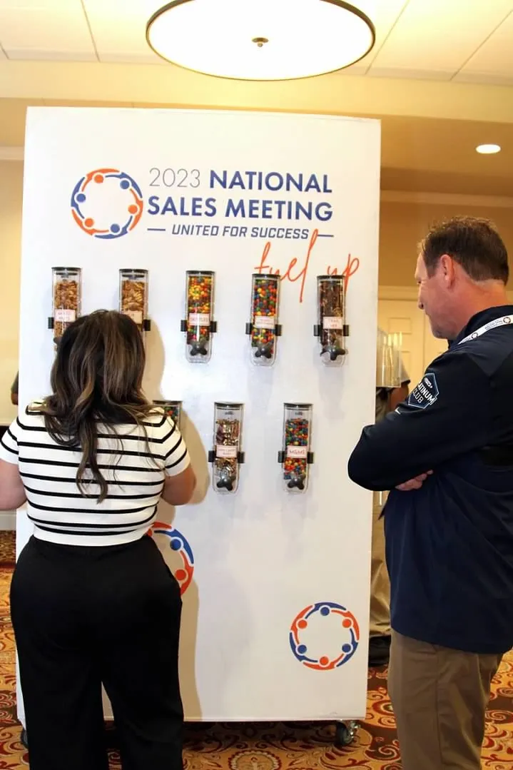 Guests at the National Sales Meeting fuel up snack wall