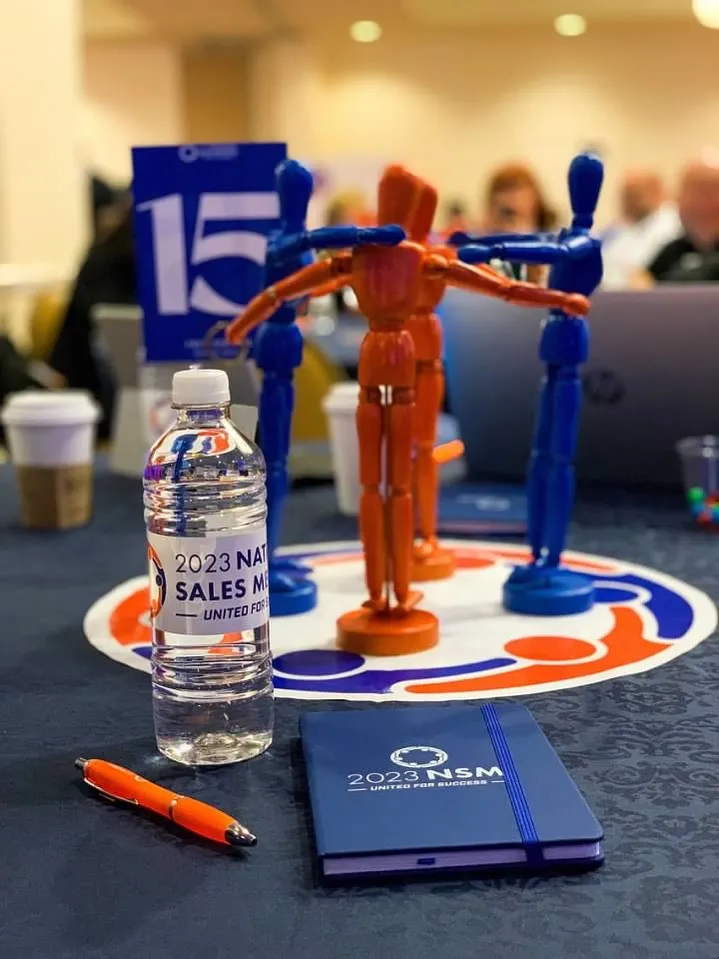 National Sales Meeting branded table centerpiece with figurines