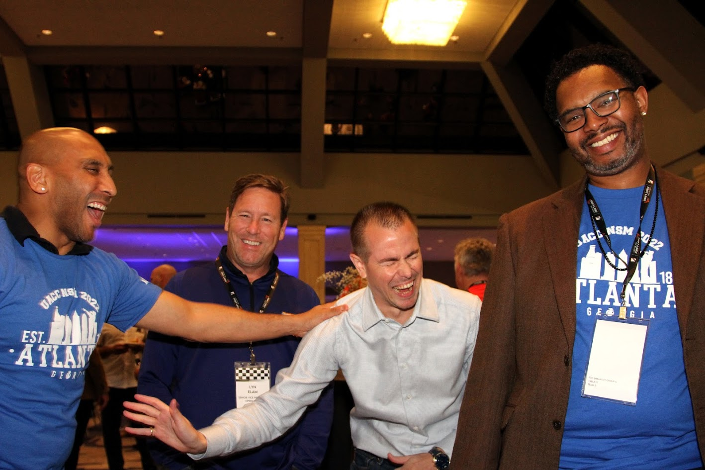 Candid team laughter at an Atlanta event