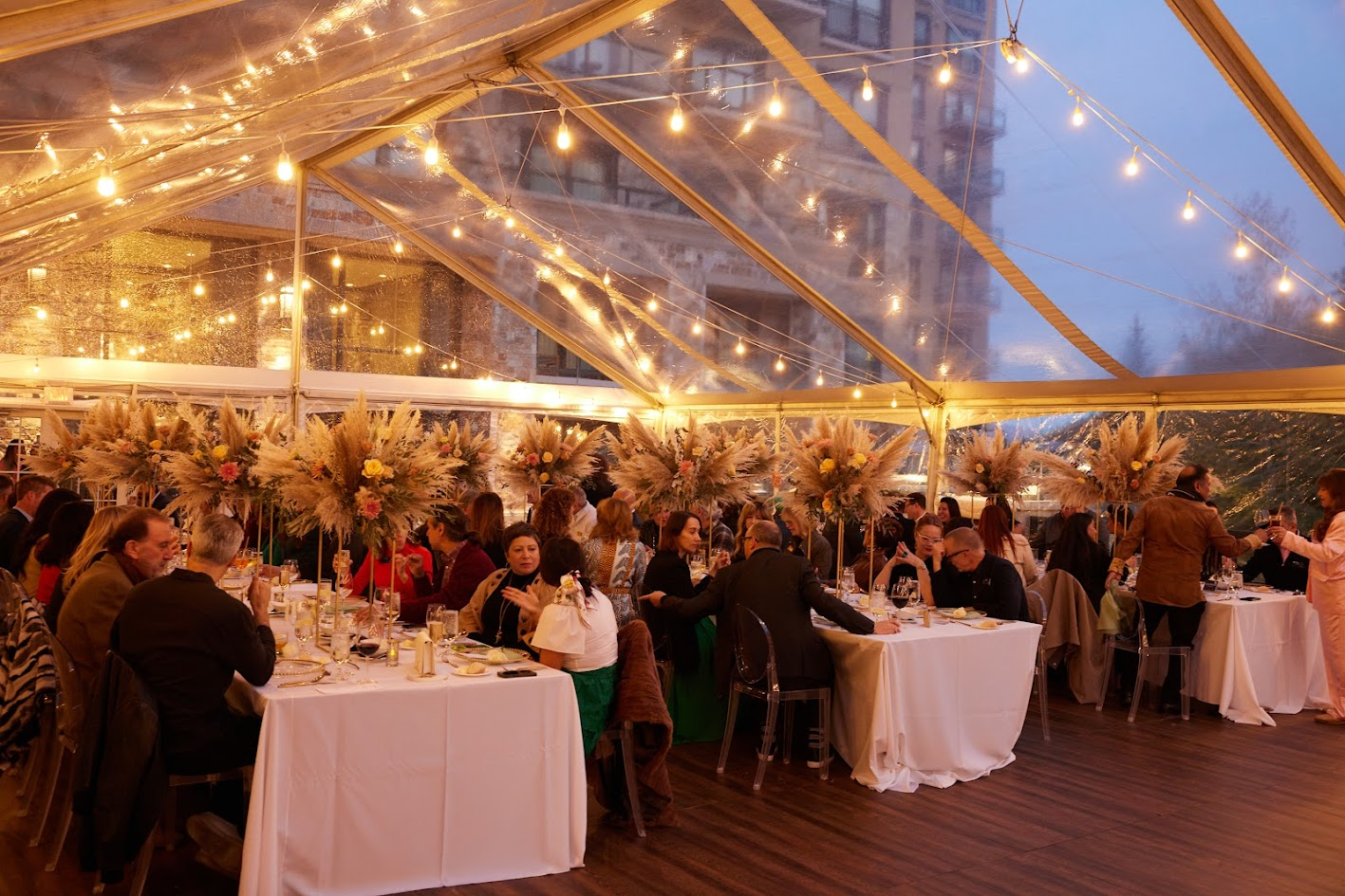 Event dinner under a clear tent
